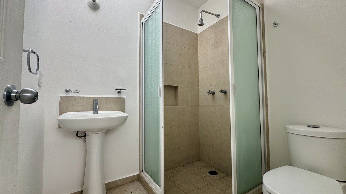 18 de 22: Baño compartido