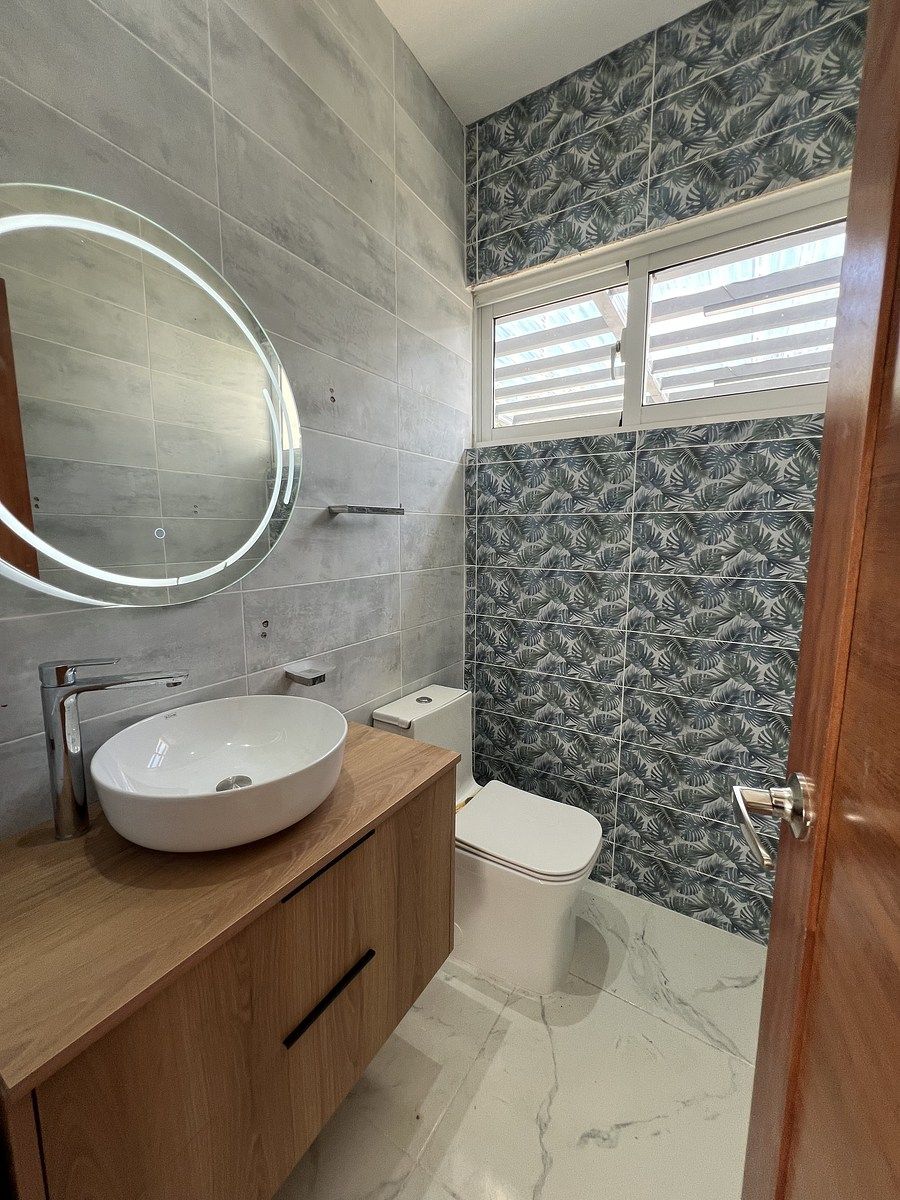 24 de 39: Baño de visita