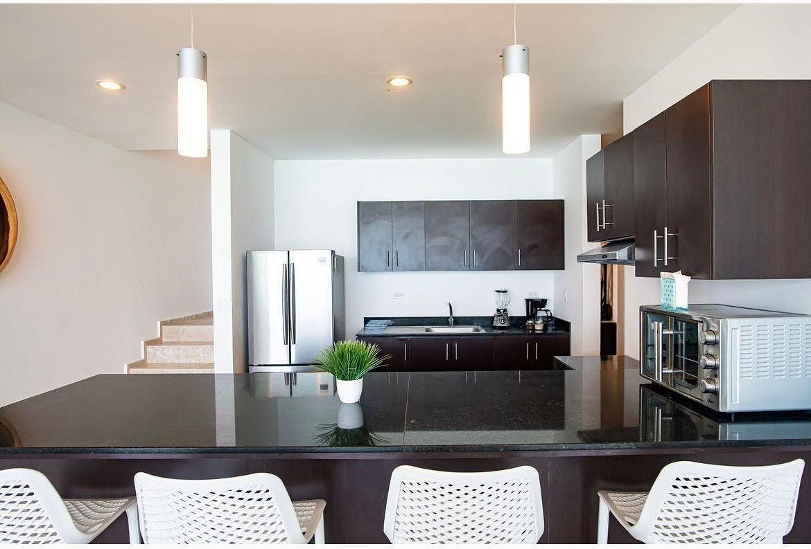 15 de 24: Cocina equipada con un espacio inspirador