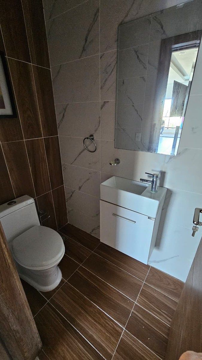 15 de 17: Baño visita