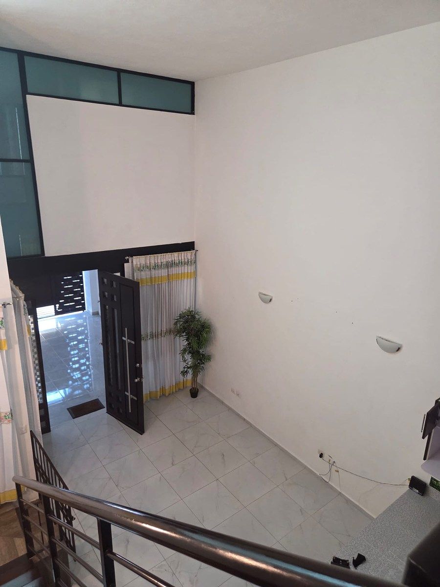 13 de 19: sala comedor doble altura