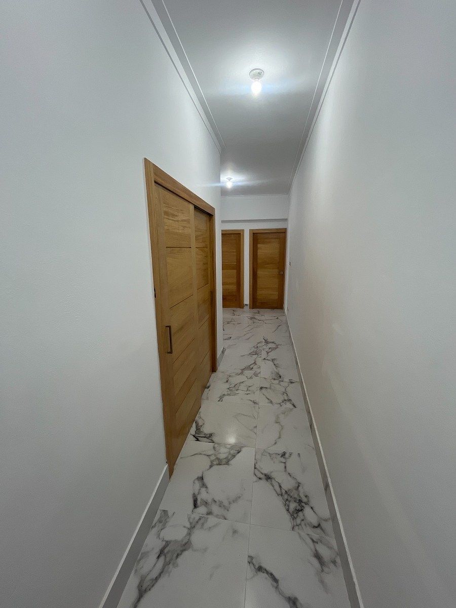 4 de 15: Clóset de ropa blanca