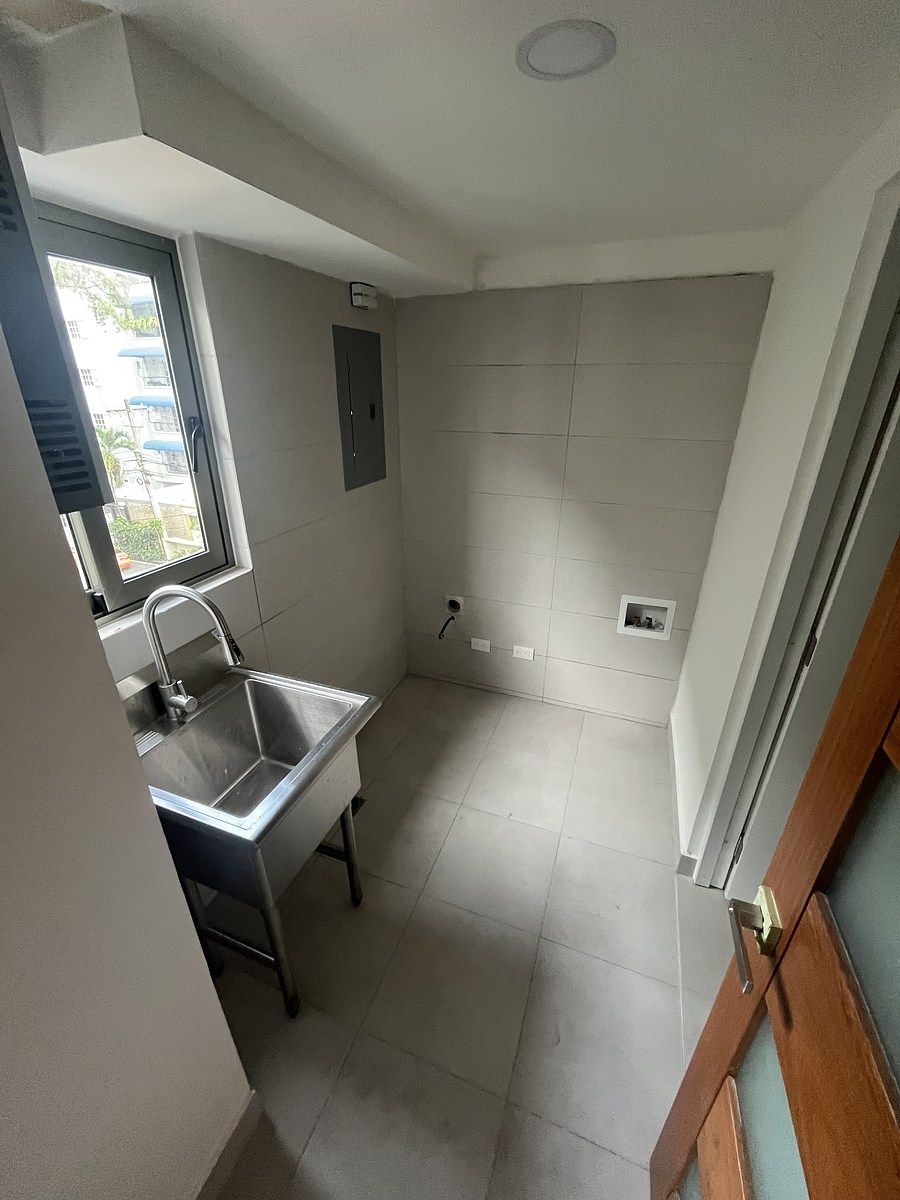 11 de 12: Área de lavado y cuarto de servicio