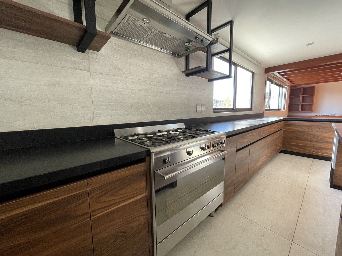 17 de 49: Estufa y campana