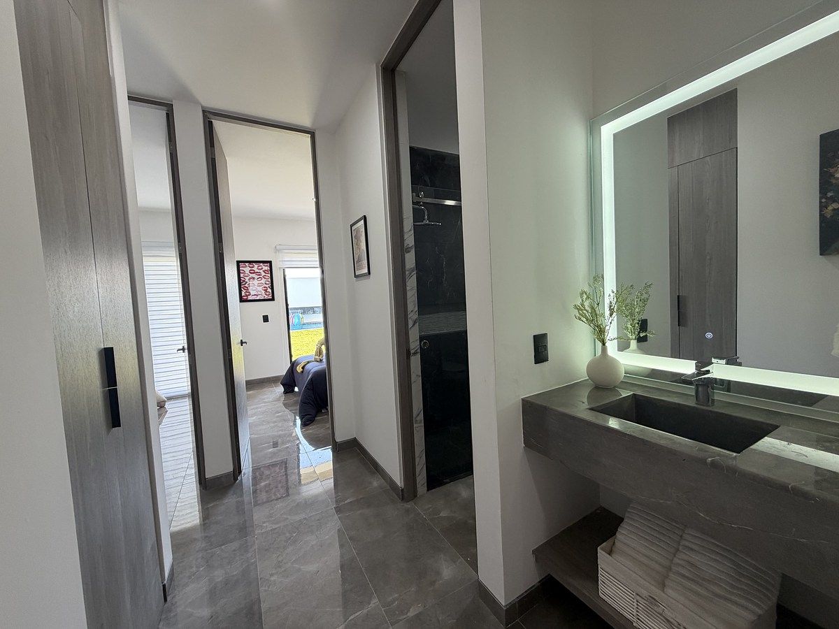 9 de 16: Baño compartido Lavabo