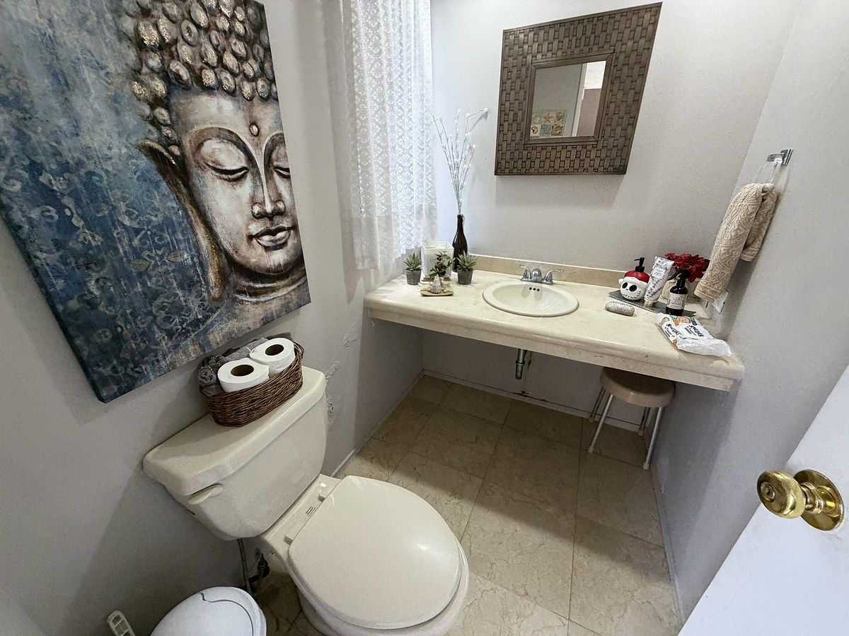 26 de 27: Baños de visitas