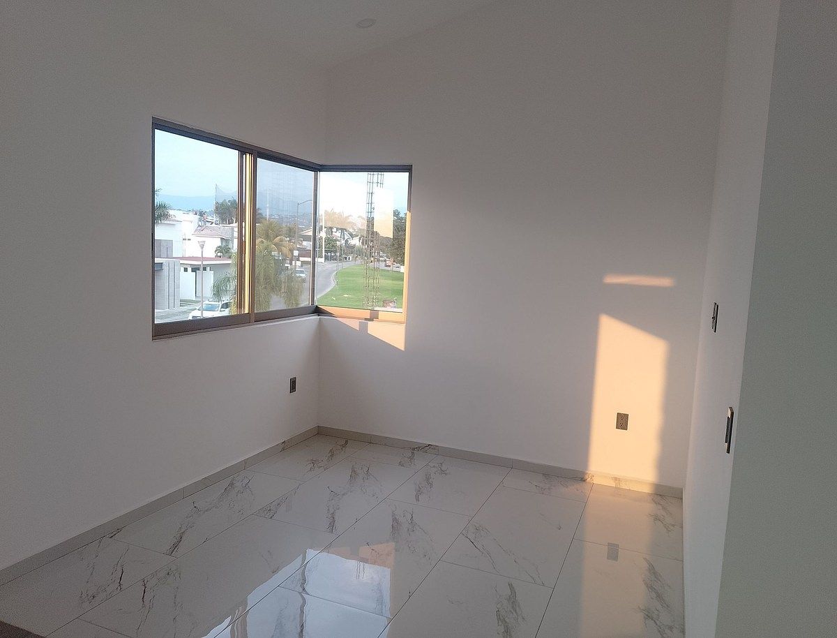 15 de 25: Sala de TV