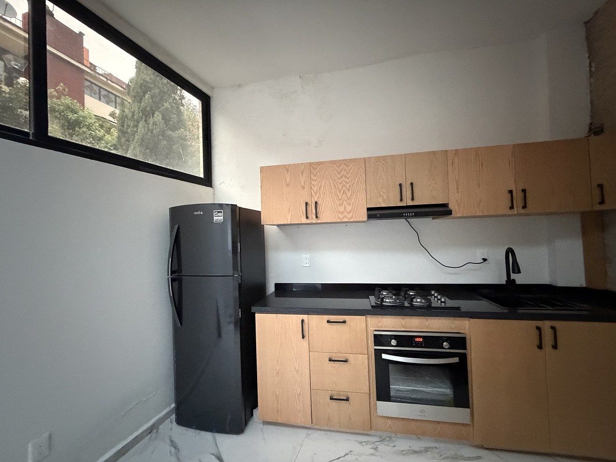 5 de 19: Cocina del departamento independiente