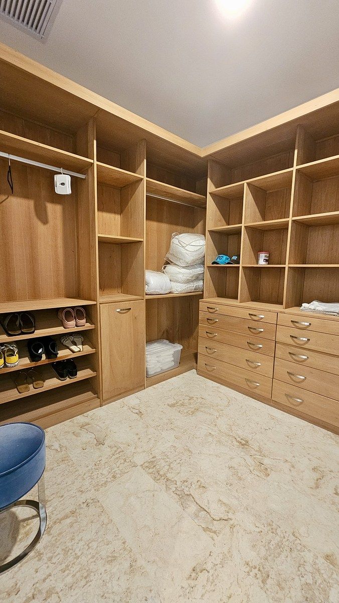 9 of 17: Main Walk-In Closet