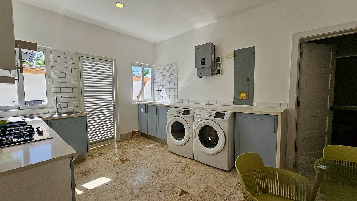 17 of 17: Laundry and work kitchen