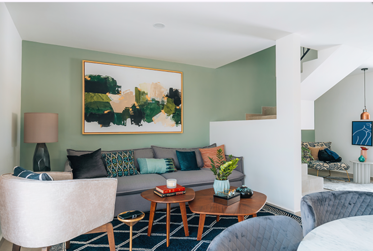 2 of 6: Sala, (fotografía de promoción de casa prototipo).