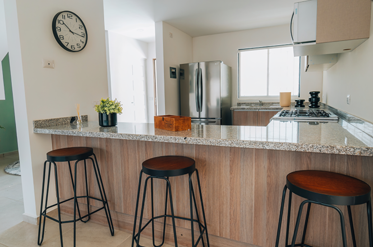 3 of 6: Cocina, (fotografía de promoción de casa prototipo).
