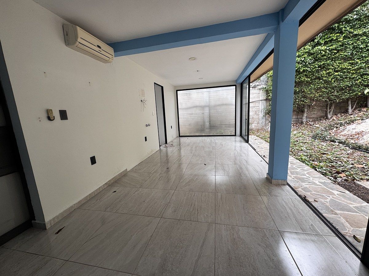 31 de 39: Área de convivencia con jardín