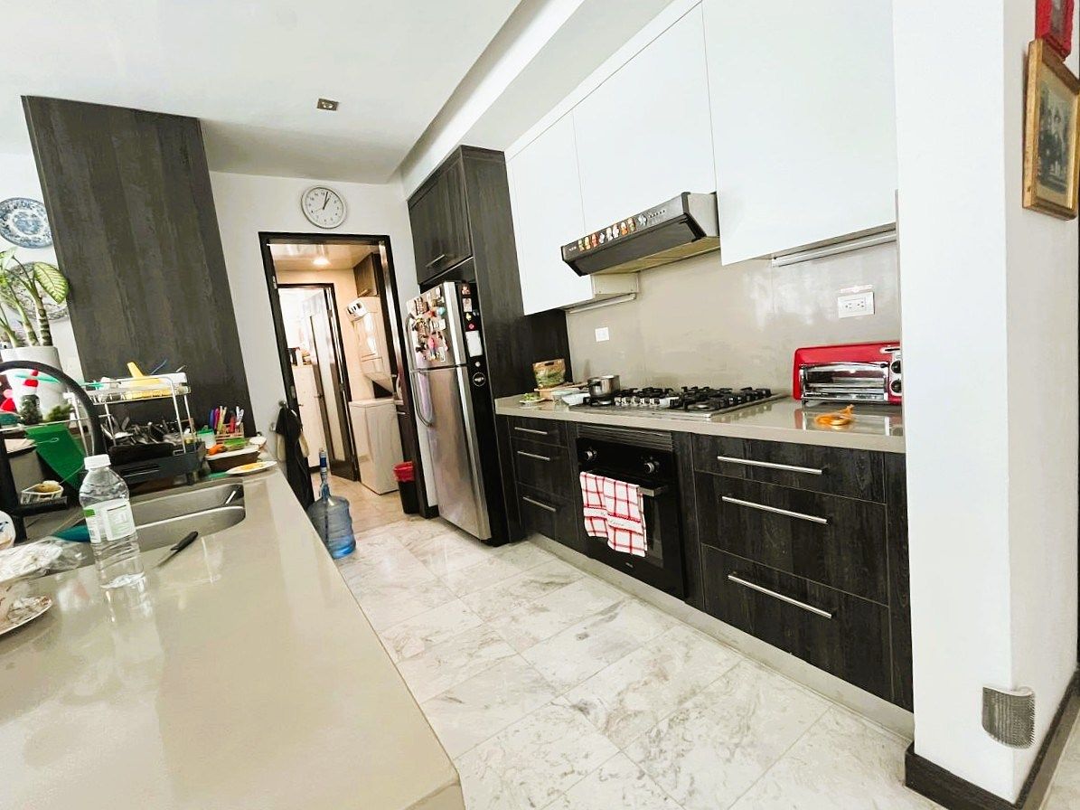 9 de 21: Cocina, área de lavado y cuarto de servicio