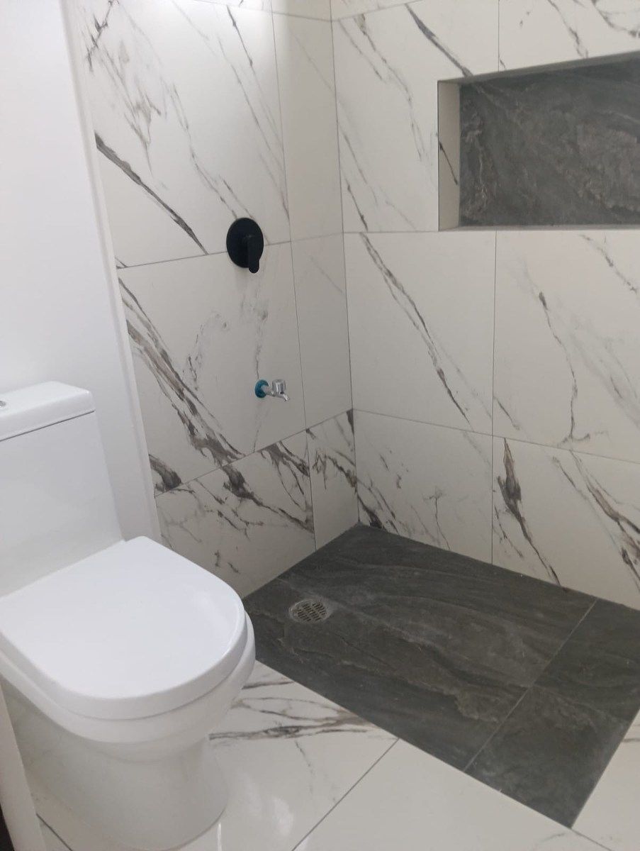 14 de 37: Baño de servicio