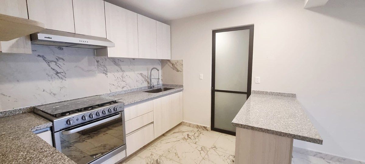 8 de 35: acceso a área de lavado