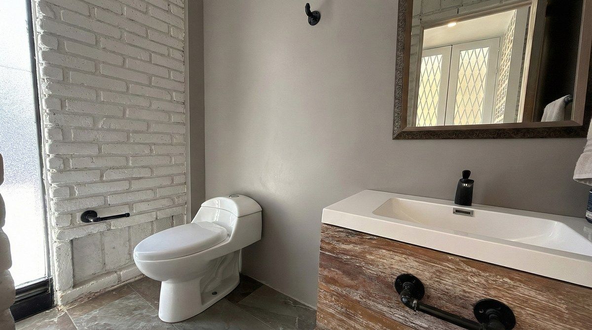 4 de 32: MEDIO BAÑO