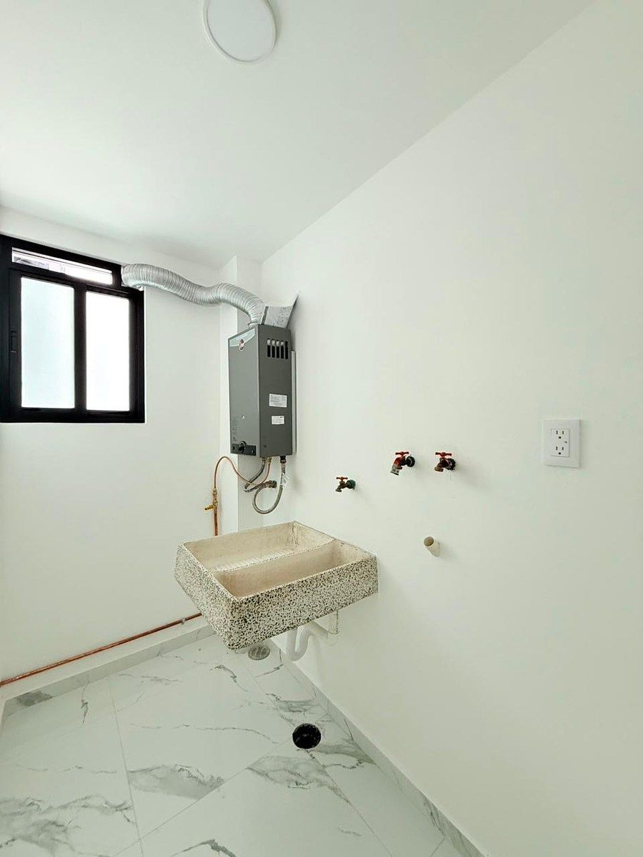 12 de 19: CUARTO DE LAVADO