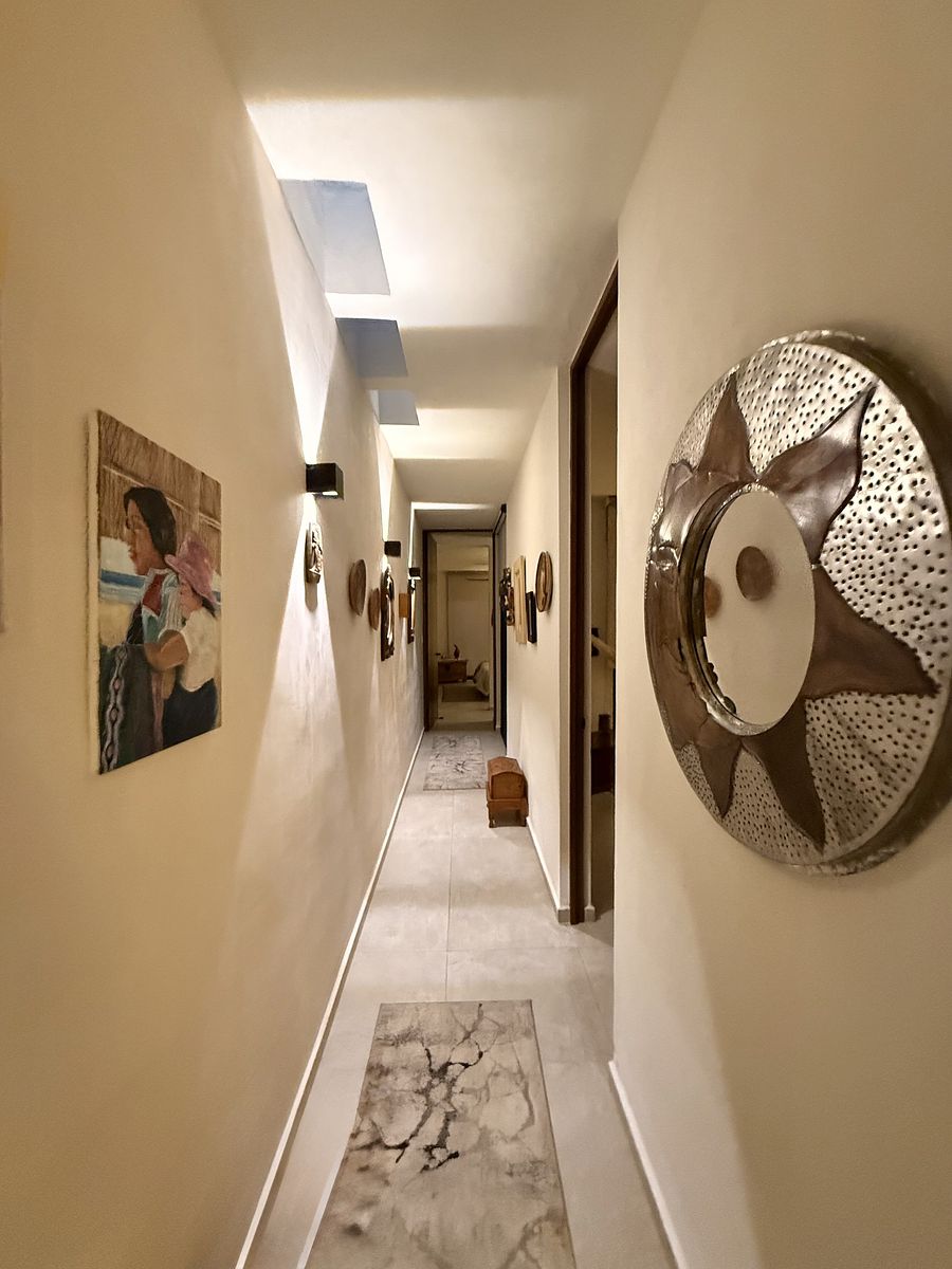 5 of 23: pasillo hacia los cuartos