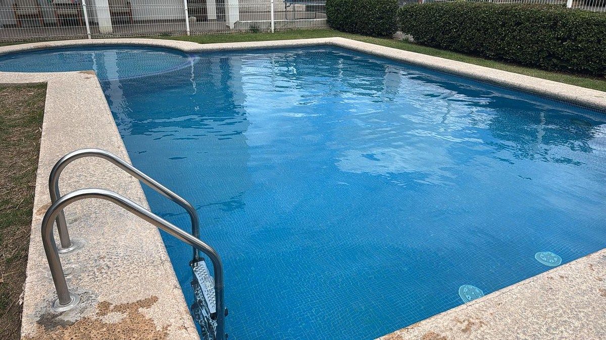 11 de 11: Zona de alberca con palapa, zona salón de usos múltiples.