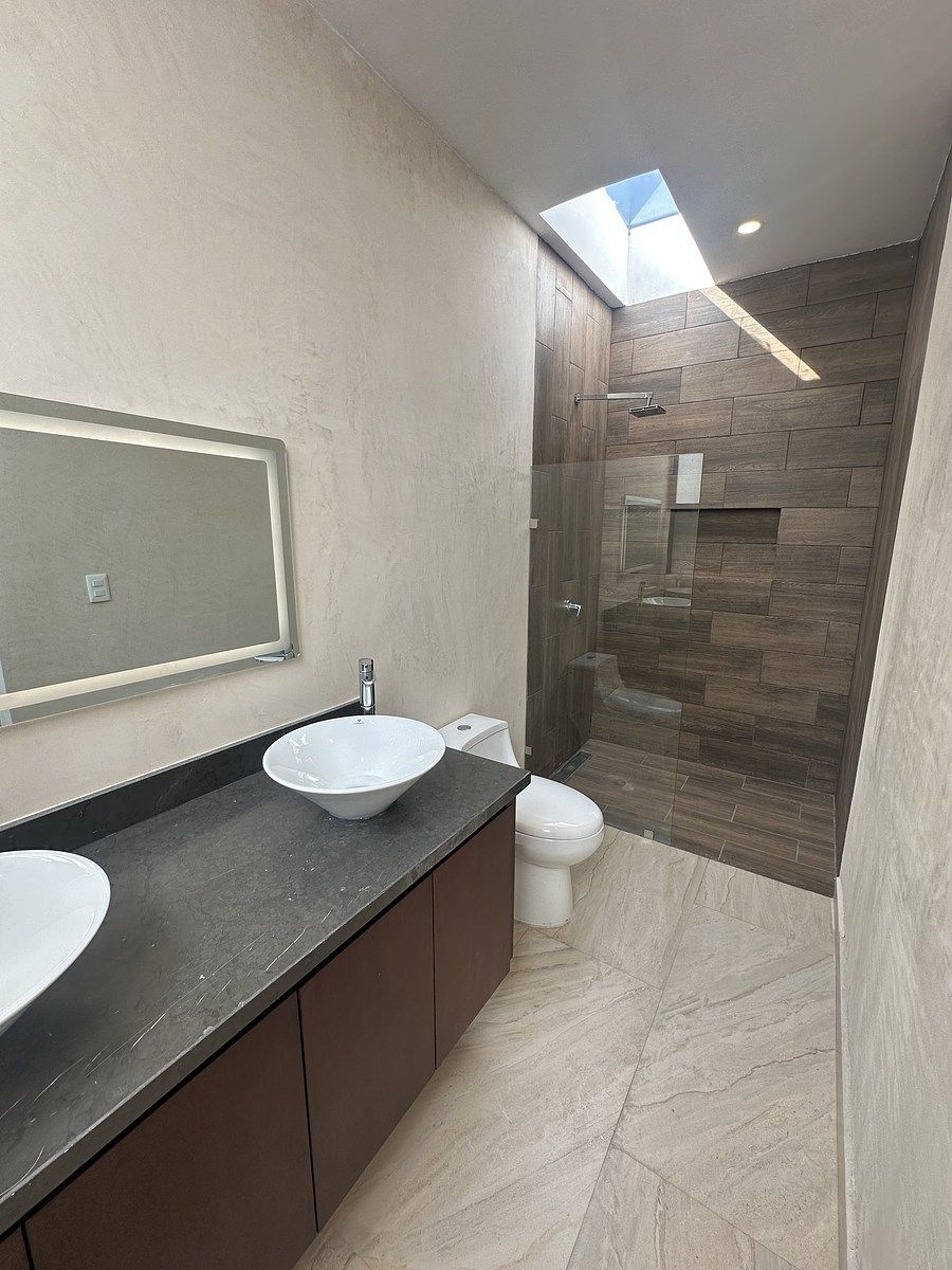 16 de 19: Baño por cuarto