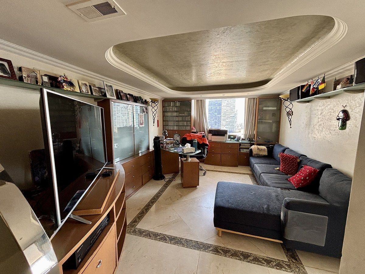 23 de 32: área de tele entre recámaras