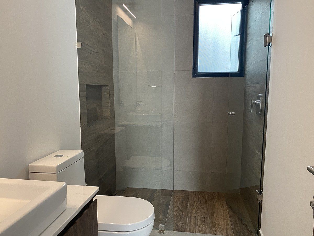 8 de 23: Baño compartido