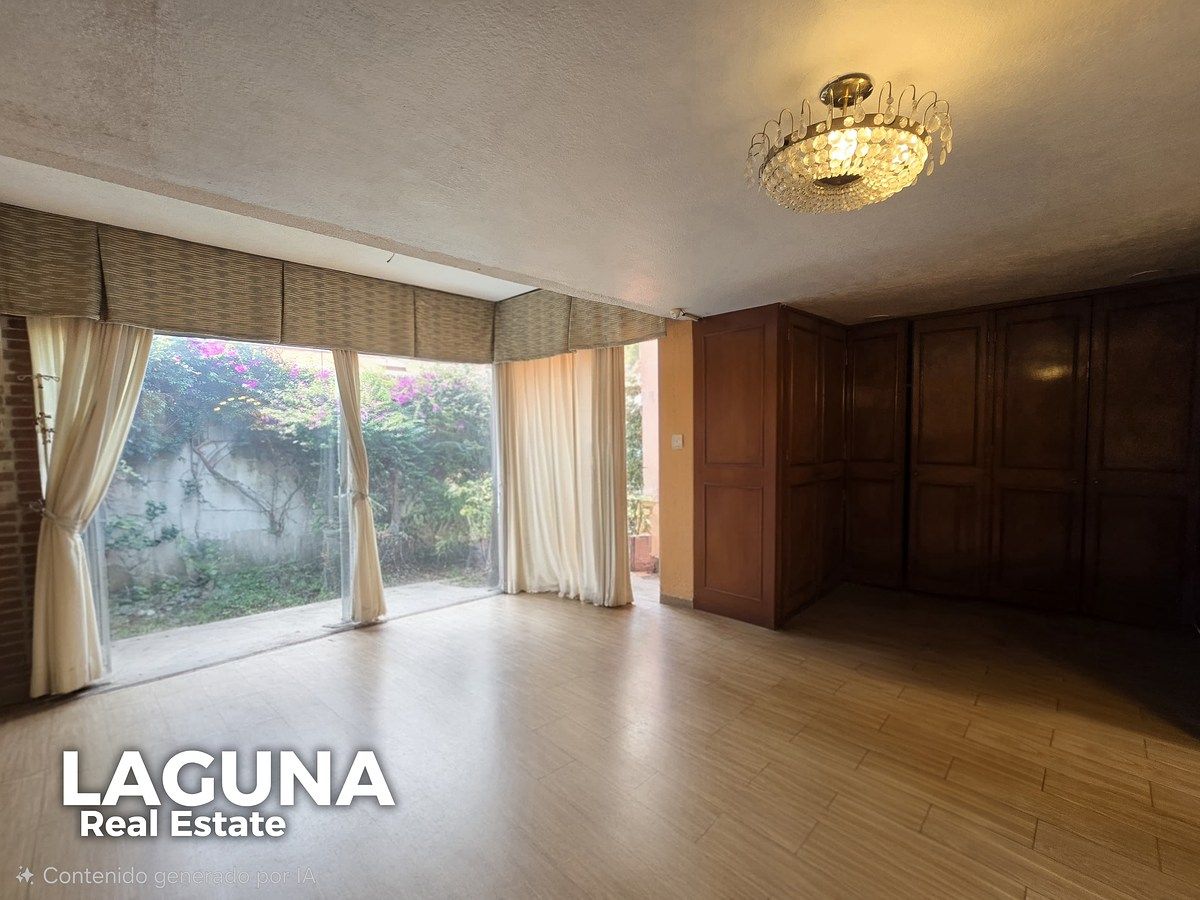 10 de 16: recamara principal con vista a jardín interior