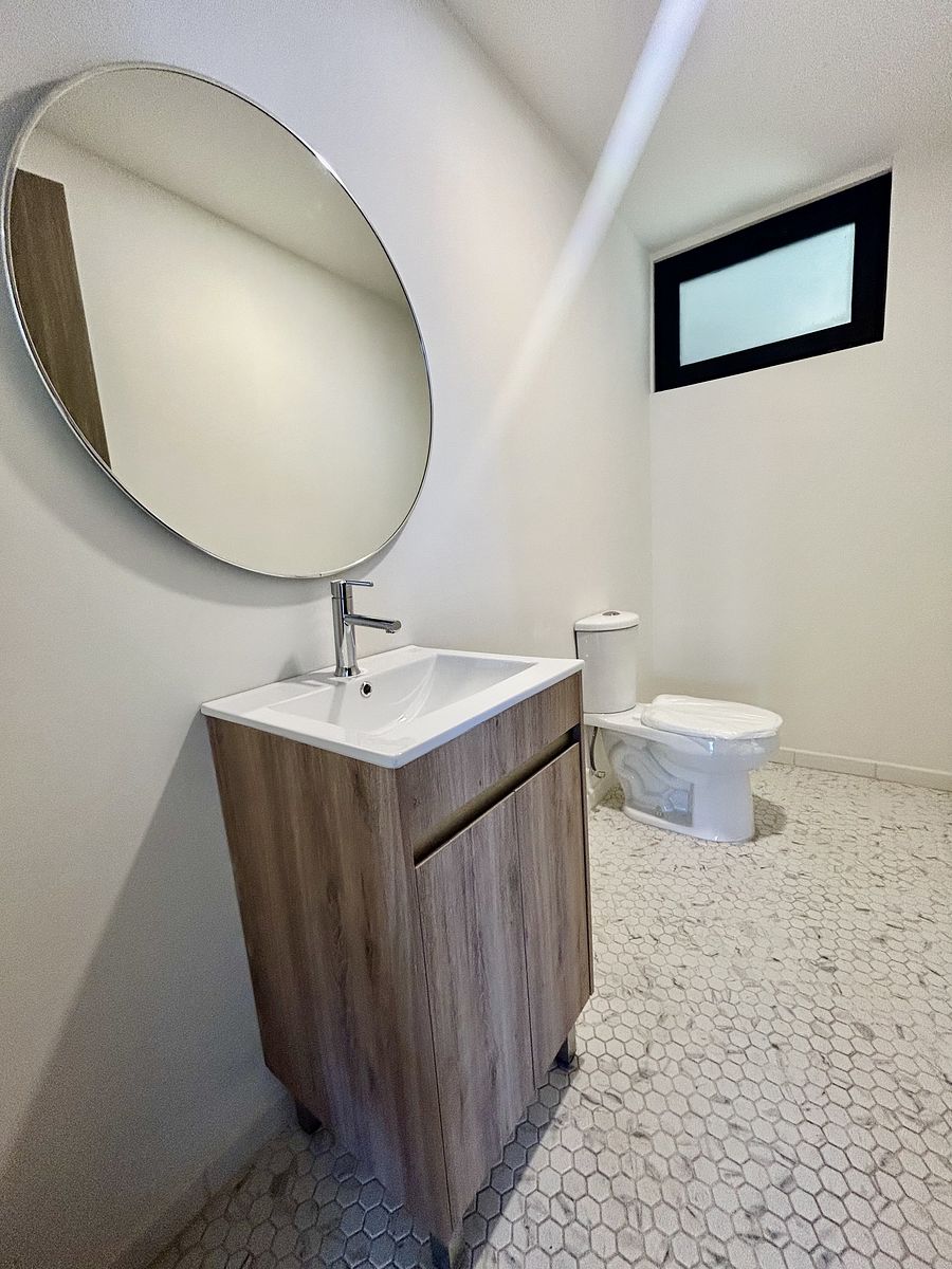 4 de 15: Baño de Visitas