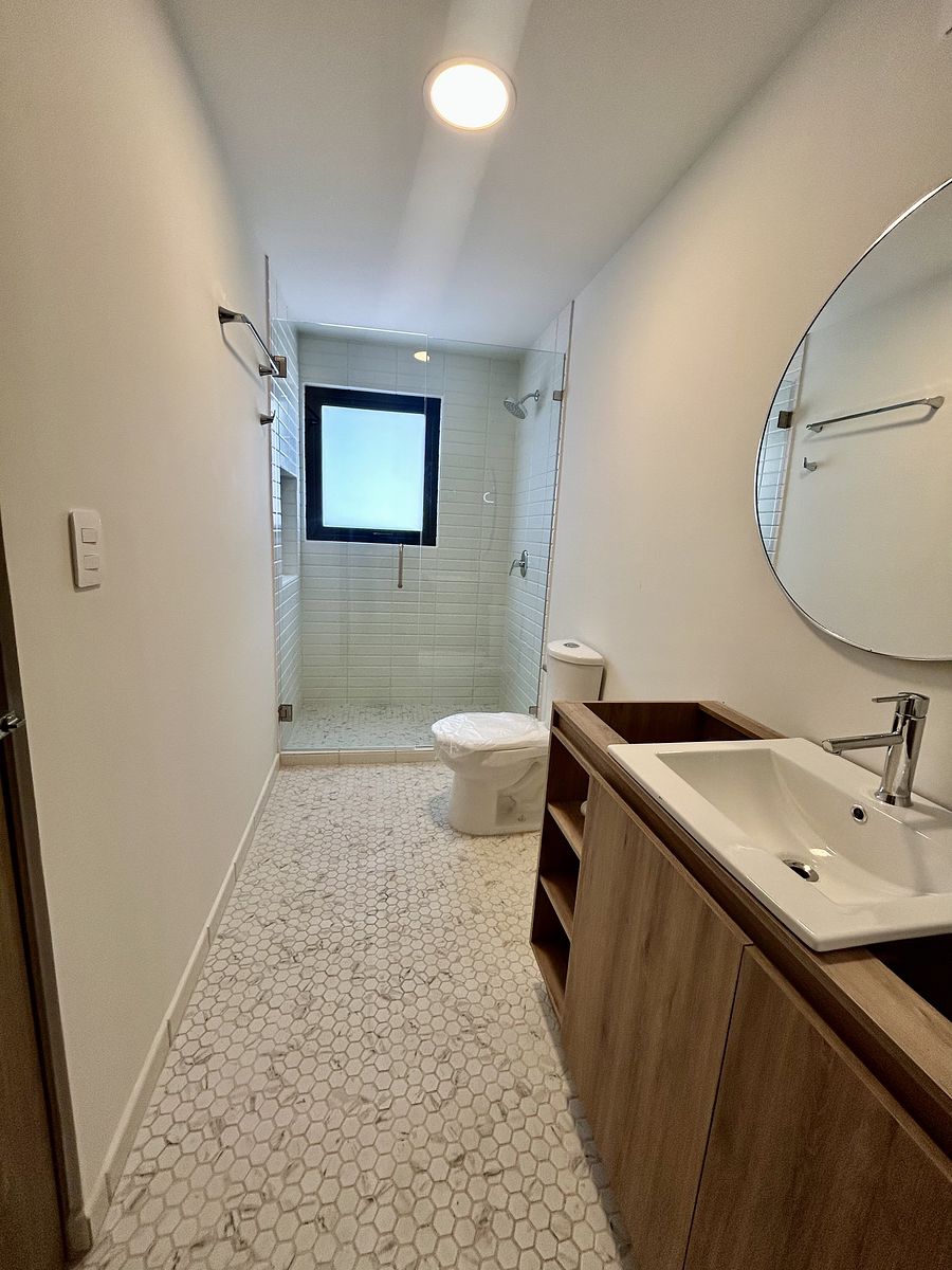 7 de 15: Baño Compartido