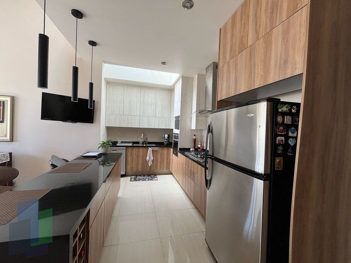 20 de 33: Cocina integral con barra desayunador