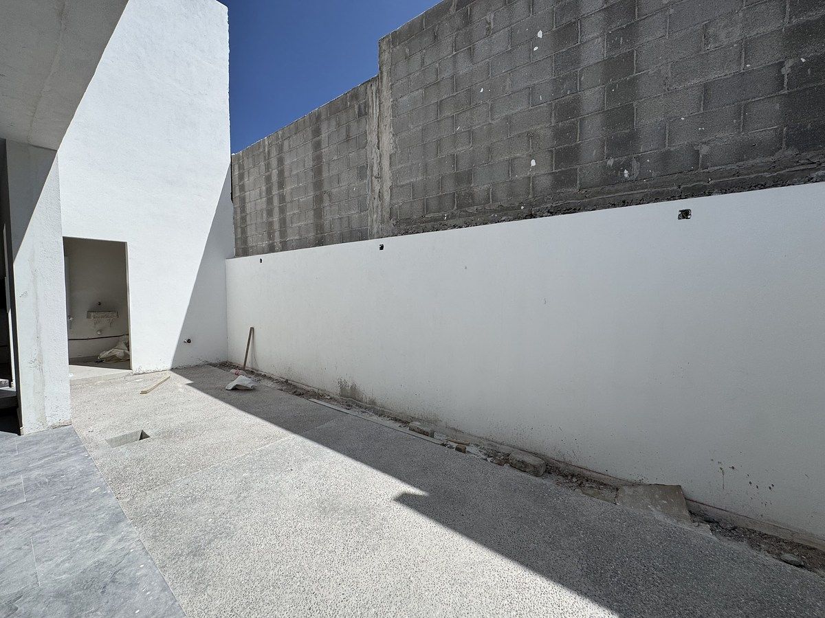 10 de 31: Patio trasero en piedra