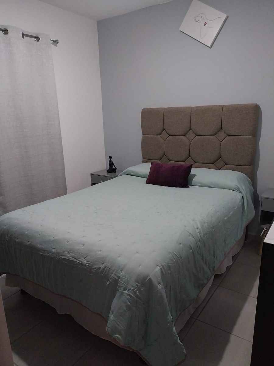 5 de 9: recámara principal con cama matrimonial