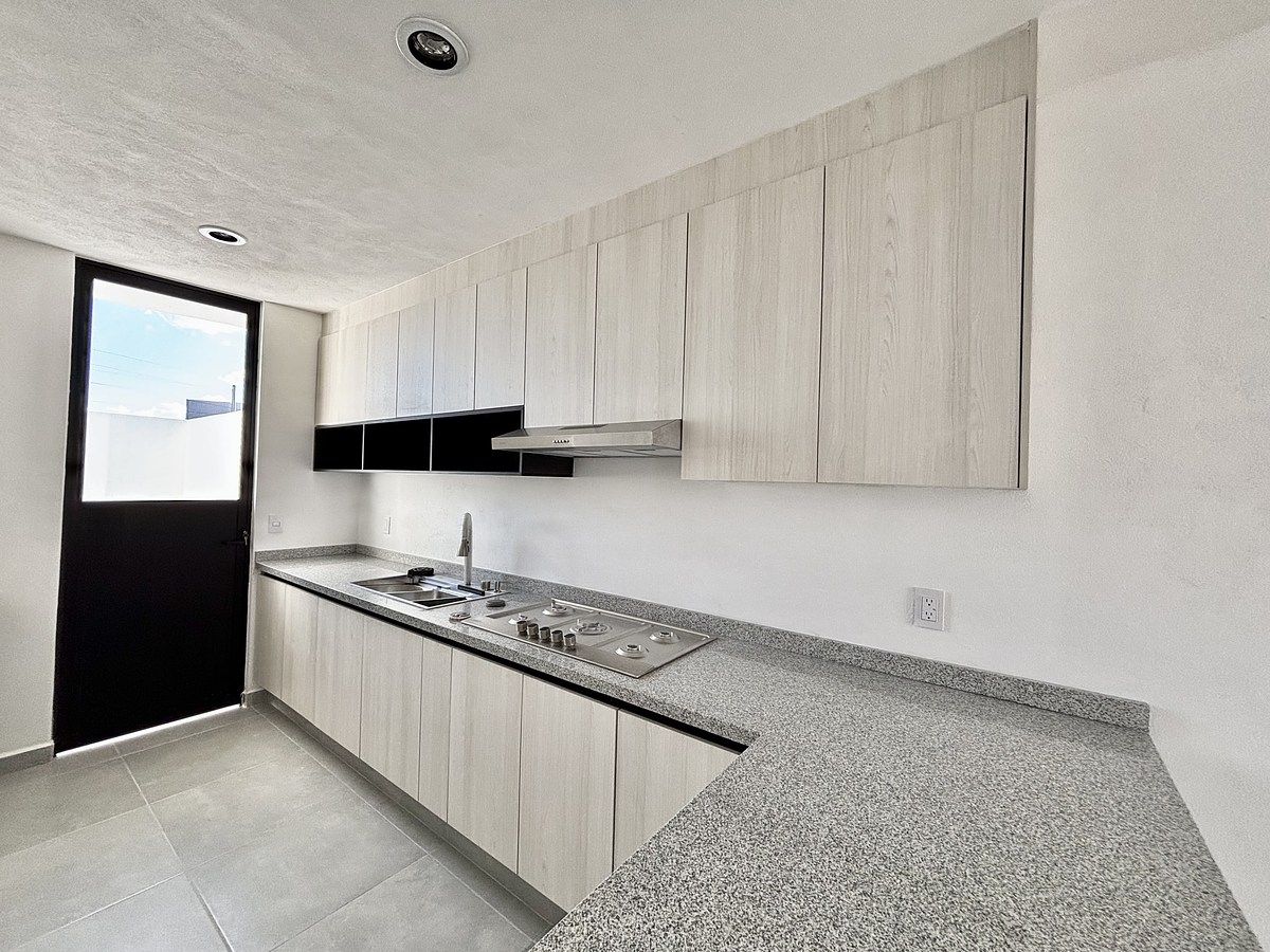 7 de 37: Con barra desayunadora.