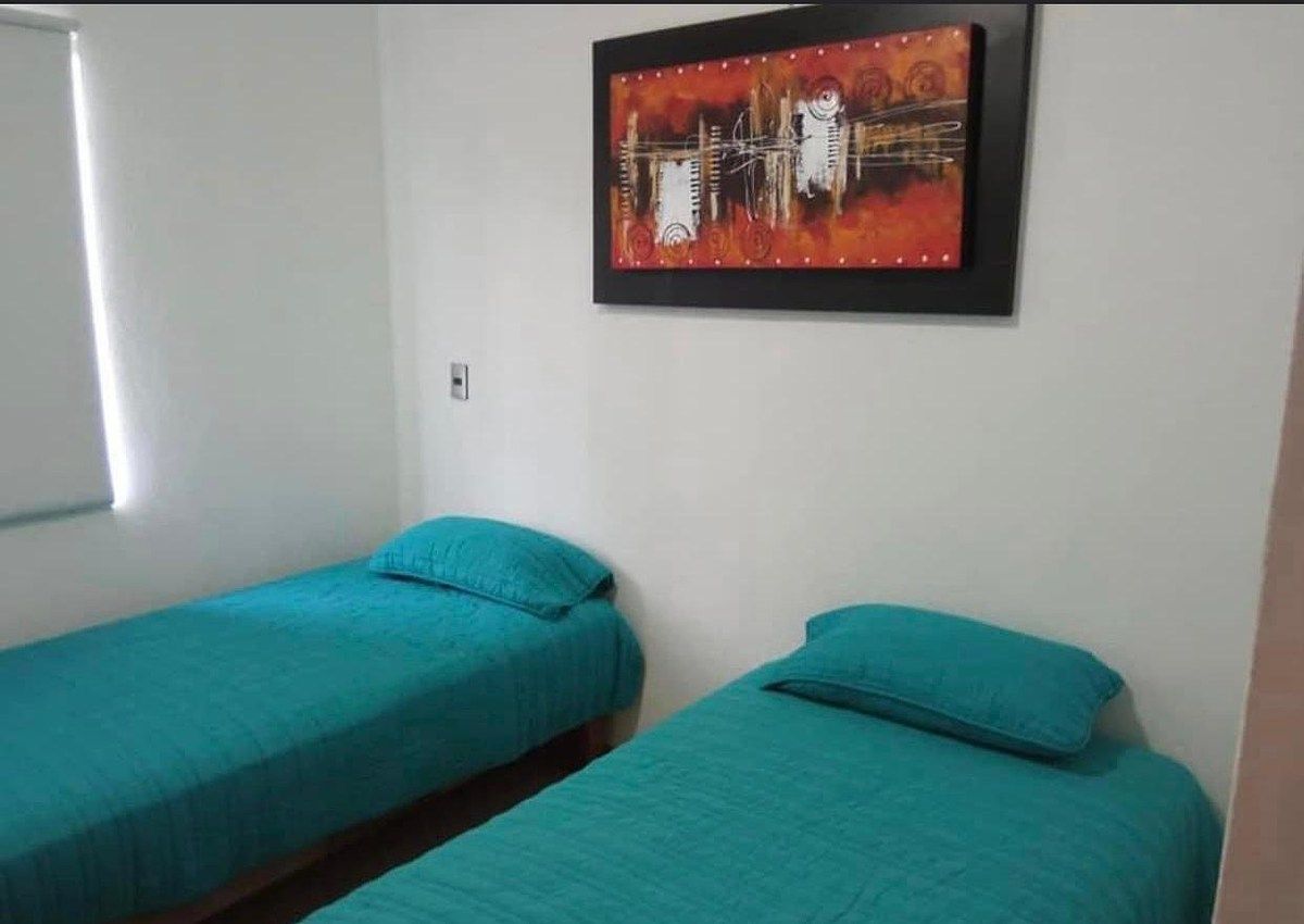 6 of 13: Recamara con 2 camas individuales