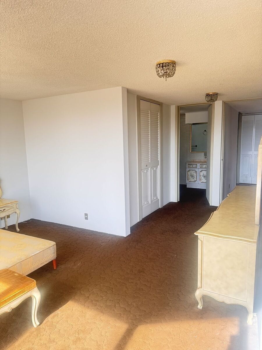 9 de 27: VESTIDOR Y BAÑO REC PRINCIPAL