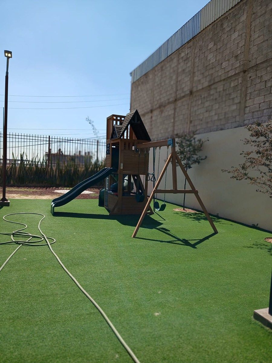 15 of 15: Área de Juego Infantil