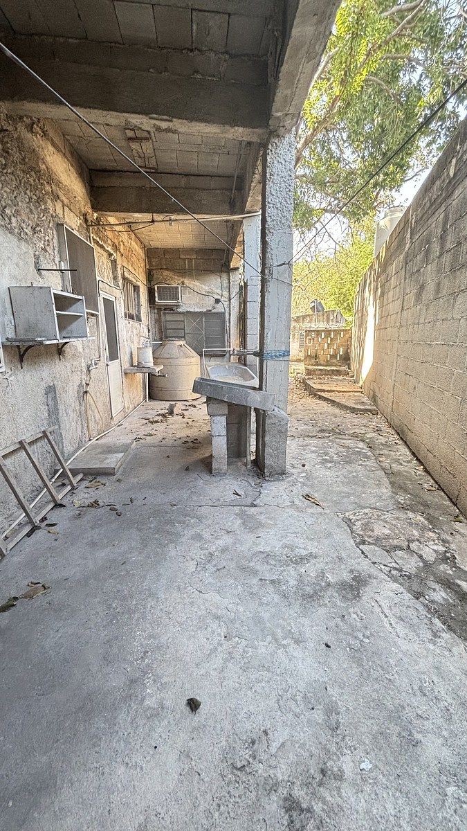 32 de 39: área de lavado techada