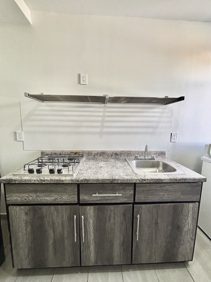 18 of 37: Cocineta con parrilla