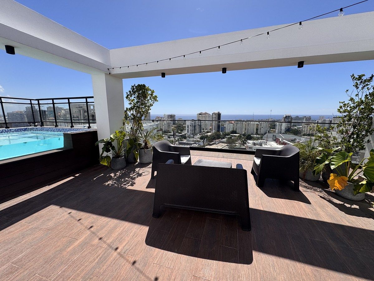 1 de 32: Area social con vista al mar