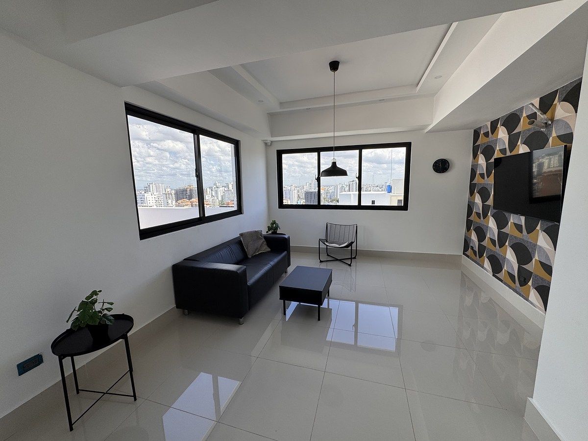 27 de 32: Salon con TV