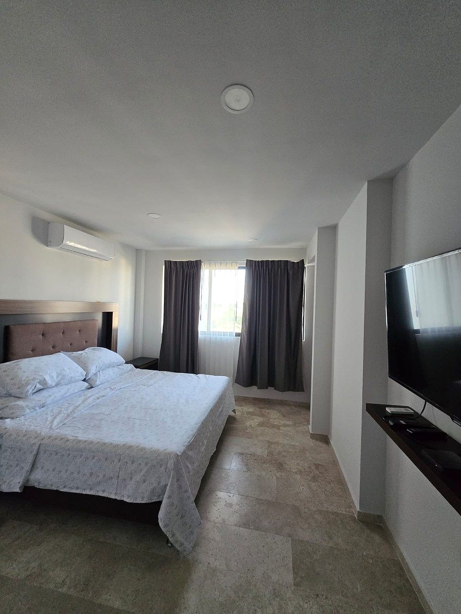 5 de 12: Habitación con TV , aire acondicionado