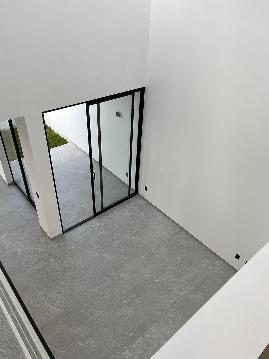 11 de 25: Sala doble altura