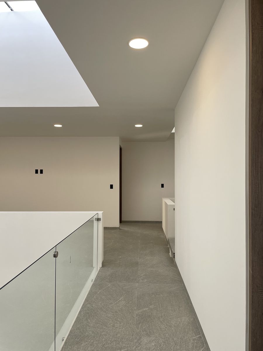 21 de 25: Vestibulo sala tv