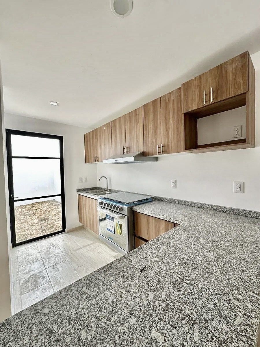 2 de 10: Cocina equipada en granito.