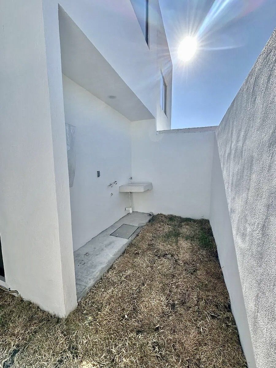 8 de 10: Área de lavado exterior techada .