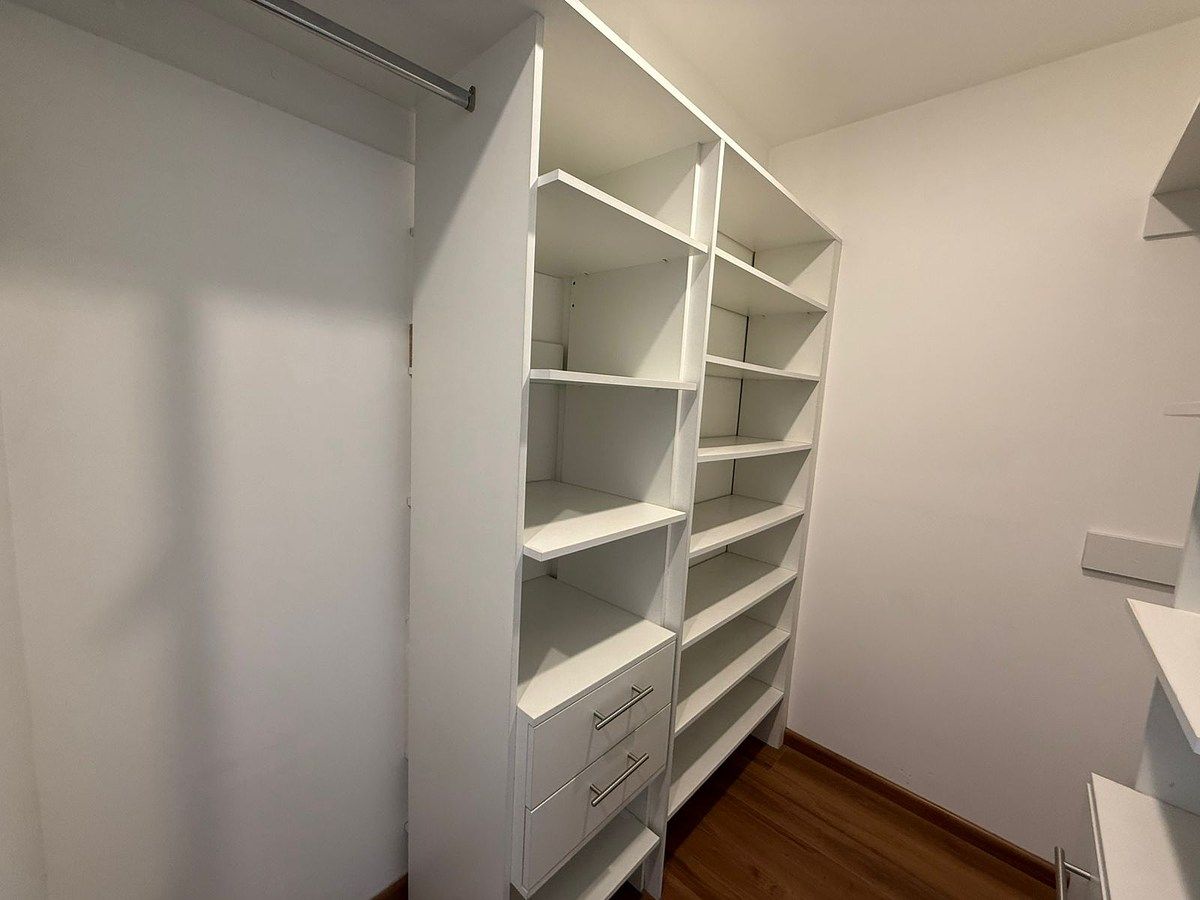 17 de 29: Vestidor recámara principal