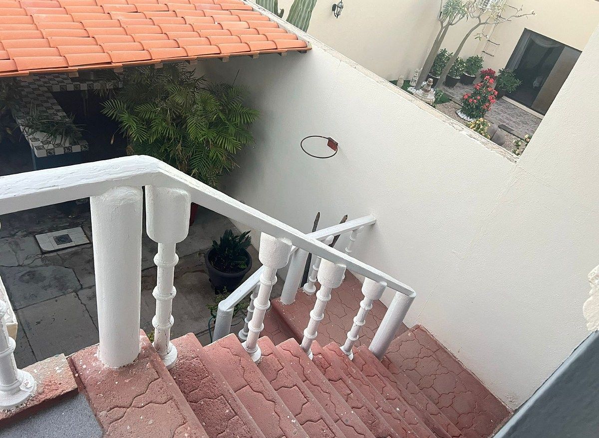 9 de 9: Escalera de acceso al departamento