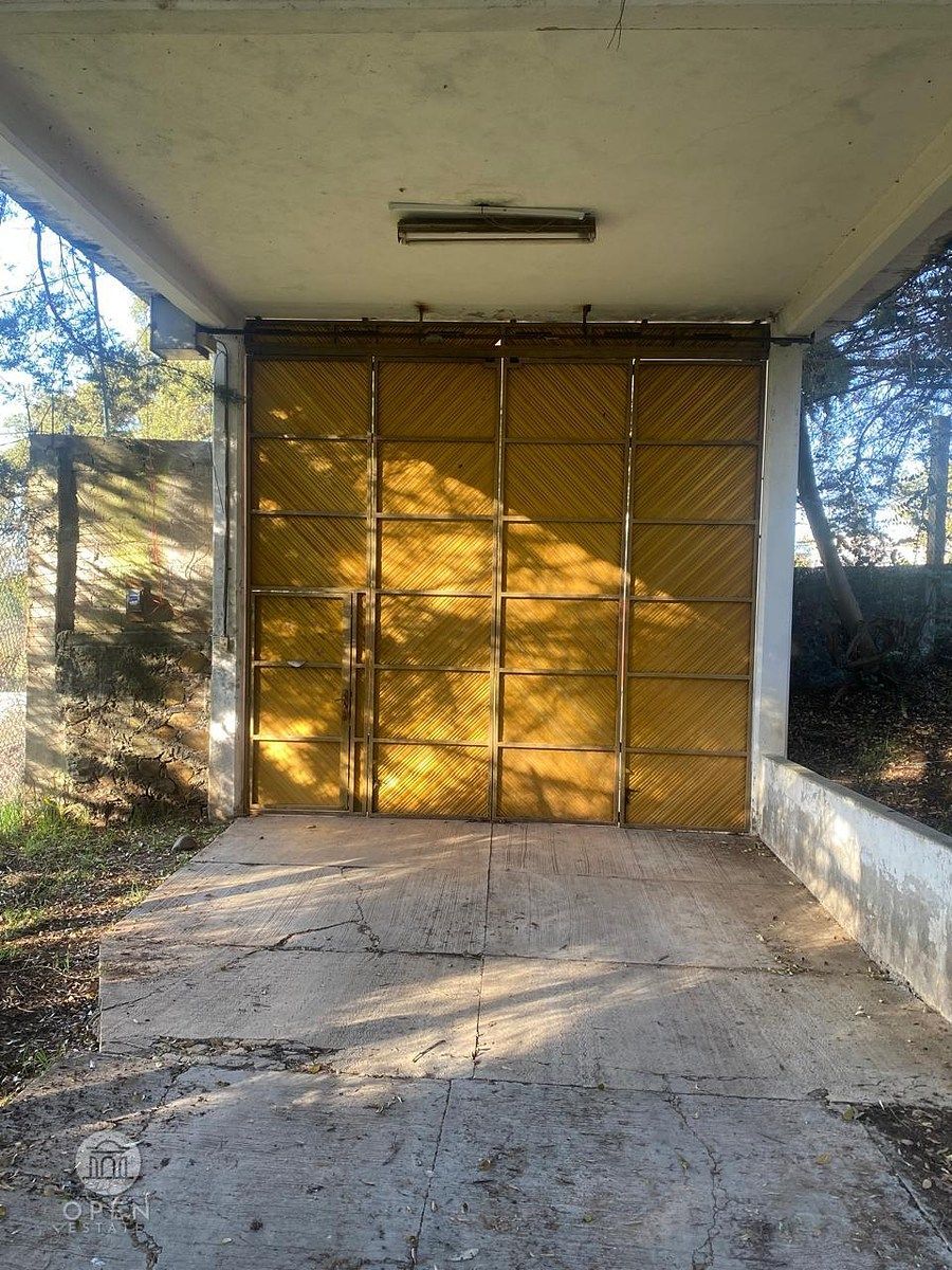 31 de 45: PUERTA DE ACCESO AL PREDIO