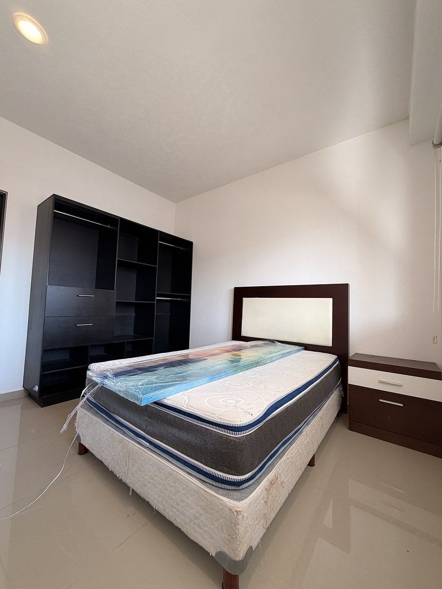 9 de 16: Recámara secundaria 1